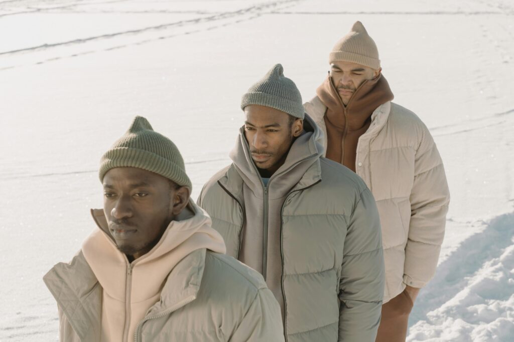 Men wearing assorted puffer jackets