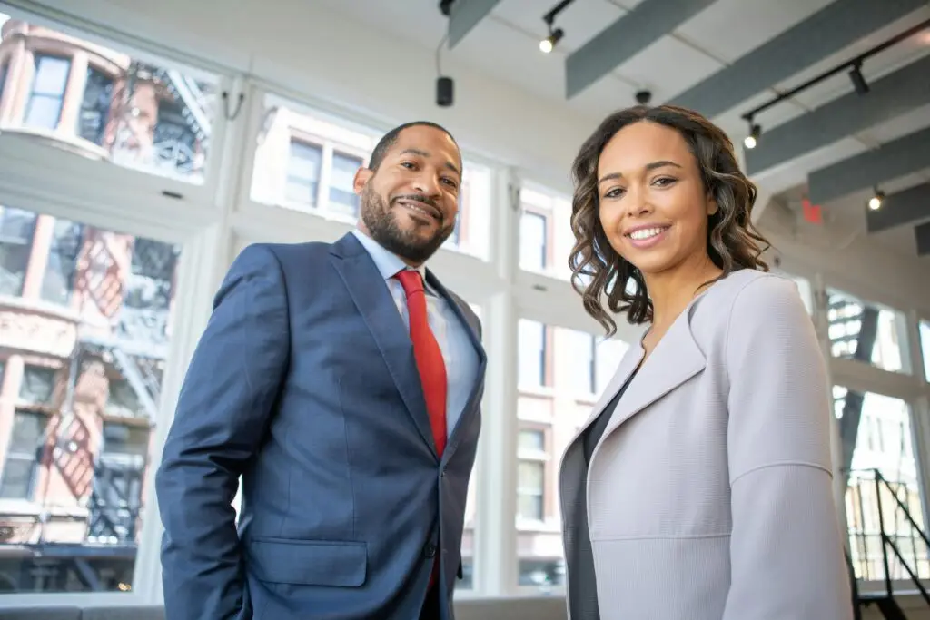 professional man and woman wearing suits